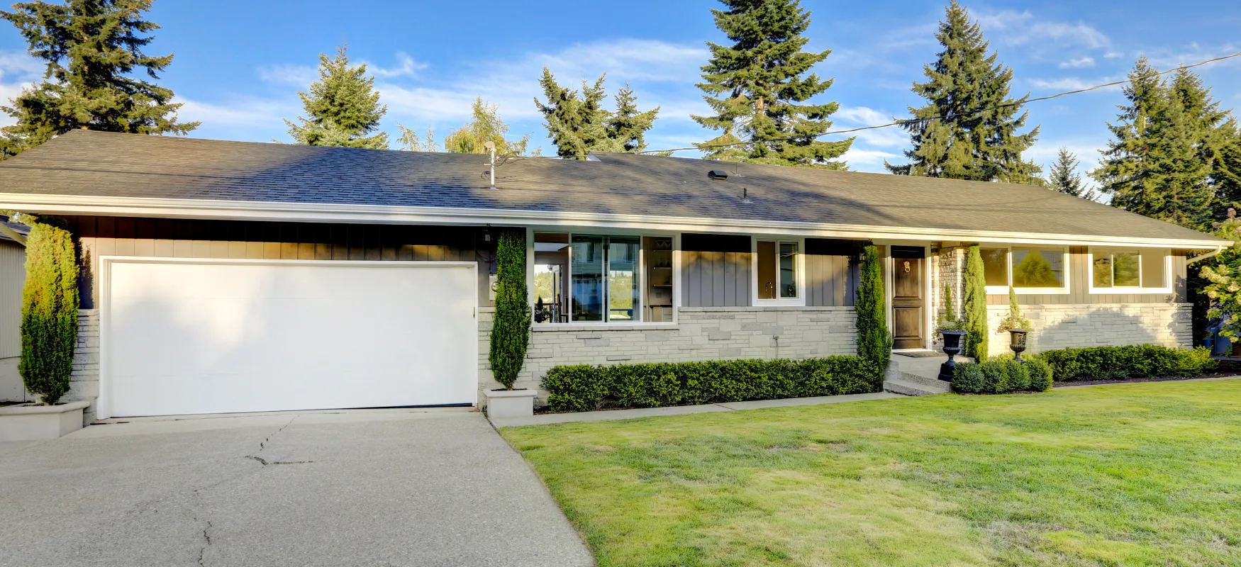 Concrete Block Ranch With Driveway Photo